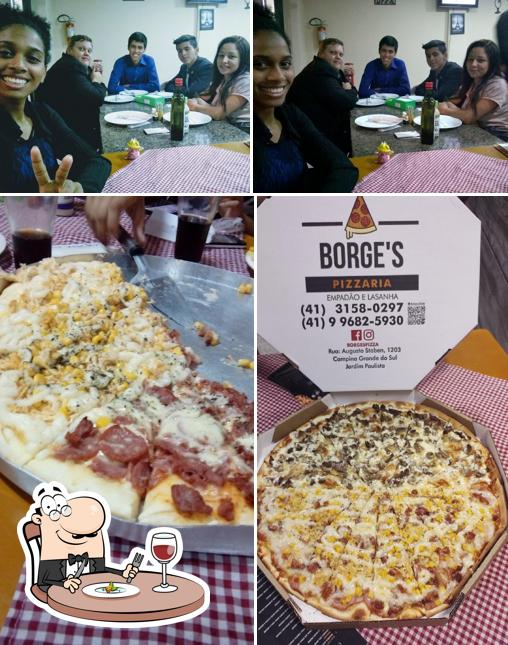 A imagem do Pizzaria Borges’s comida e mesa de jantar