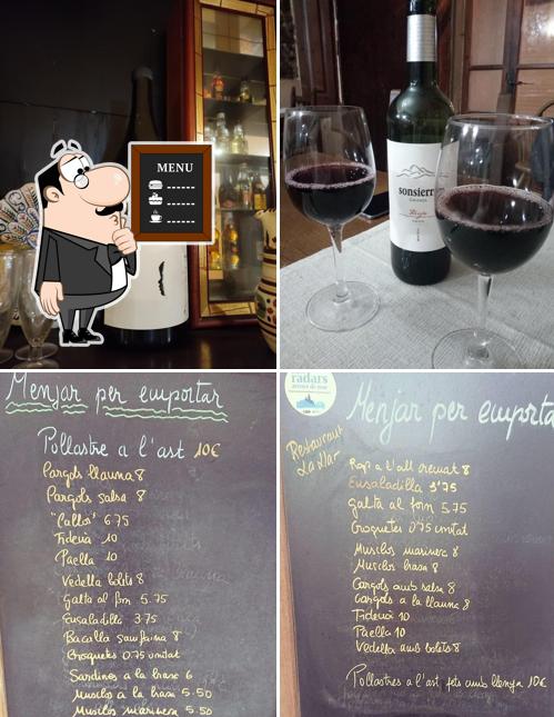 Estas son las fotos que muestran pizarra y bebida en Restaurant La Llar