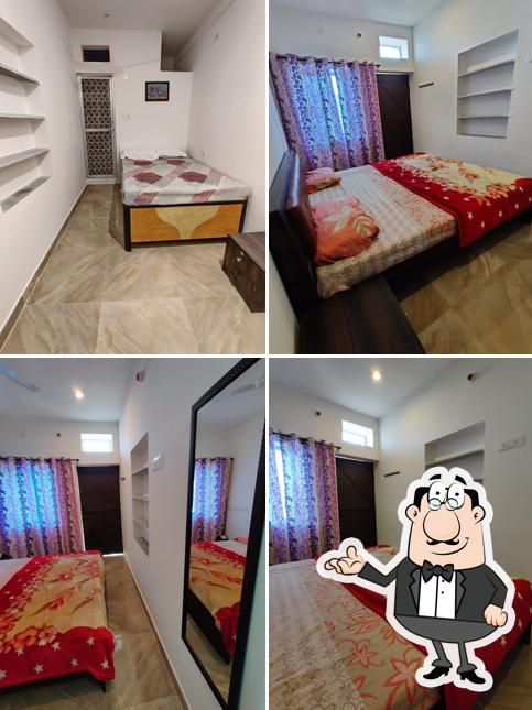 Take a seat at one of the tables at Varah Square Guest House