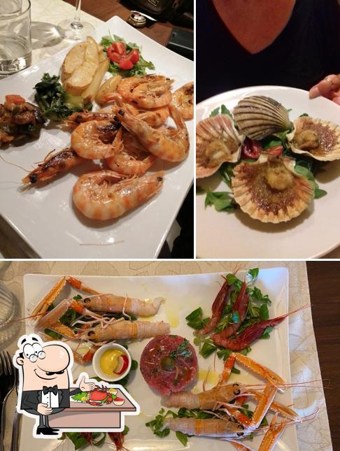 Commandez des fruits de mer à Trattoria Al Nuovo Antico Pavone