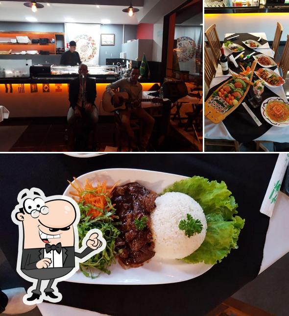 Confira a imagem mostrando interior e comida no Kanpai Asian Cuisine