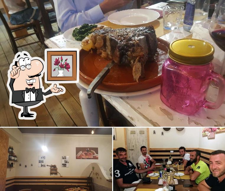 Dai un'occhiata agli interni di Osteria all'Aglione