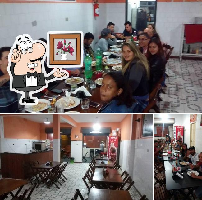 O interior do Pizzaria Dois Irmãos