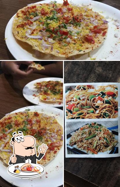 Try out pizza at Harish Lunch Home