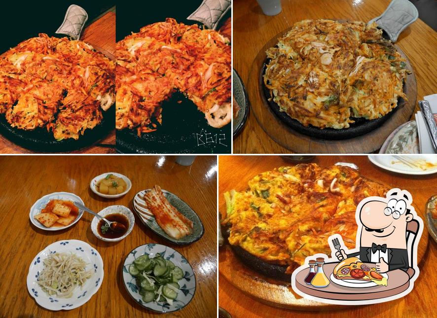 Prenez des pizzas à Restaurant Hwang Kum