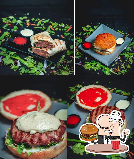 Order a burger at IDZUO SONAS GARDEN
