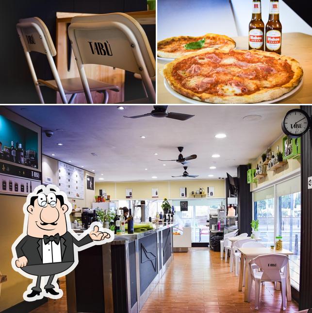 The picture of interior and pizza at Tabù
