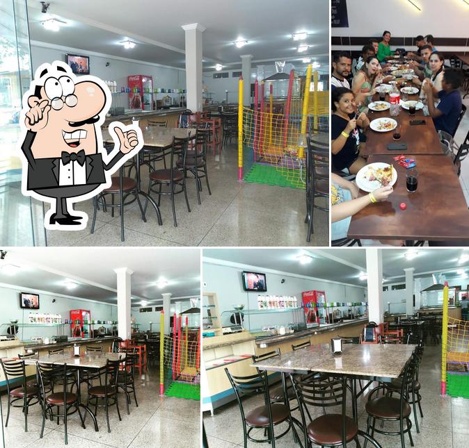 O interior do Sorveteria Caravelas - Pizzaria e Hamburgueria