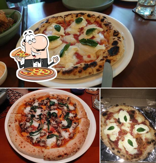 Try out pizza at NAURA BISTRO