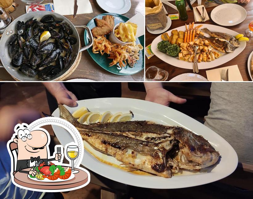 Scegli tra i molti piatti di mare disponibili a Gostilna Manjada... pu naše