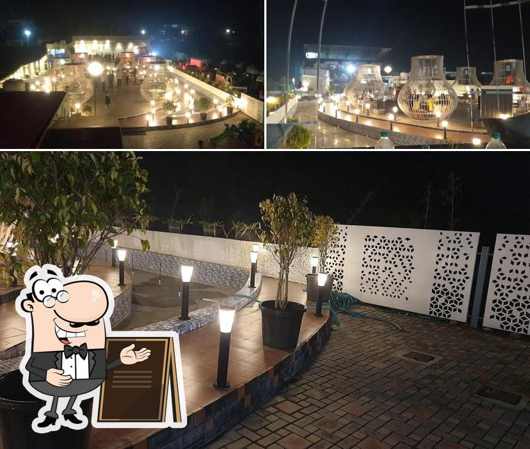 Take a look at the picture depicting exterior and interior at Maahol Restaurant