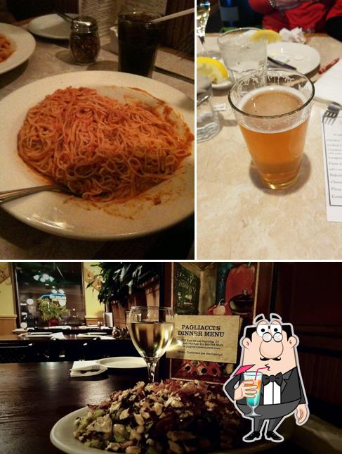 Take a look at the photo displaying drink and dining table at Pagliacci's Restaurant