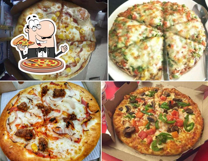 Try out pizza at Domino's Pizza