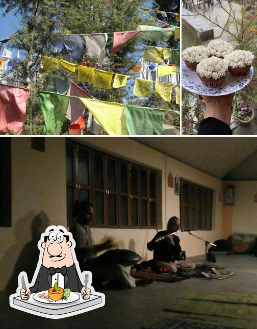 This is the image depicting food and interior at Trimurti garden Cafe and Homestay Dharamkot