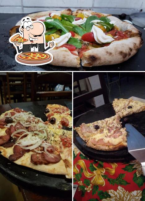 Consiga pizza no Battagini Restaurante e Pizzaria