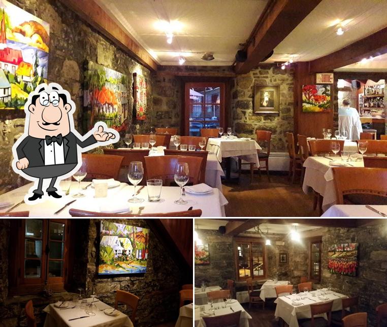 Installez-vous à l'une des tables de Restaurant Le Gourmand