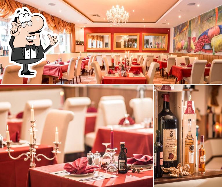 Check out the picture showing interior and wine at Zum Sängerheim - Ristorante. Pizzeria. Giovanni