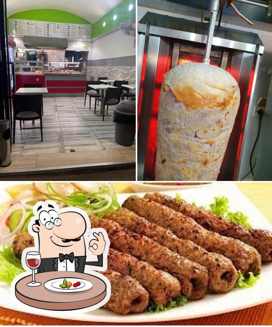 Tra le diverse cose da Ali Pizzeria Kebab si possono trovare la cibo e interni