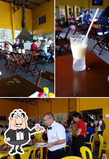 Sente em uma das mesas no Churrascaria Baião