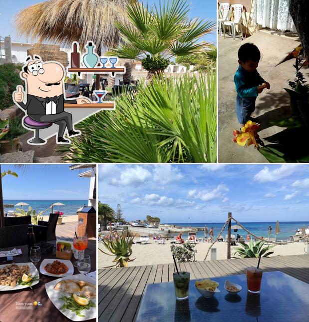 Installez-vous à l'une des tables de Bathing Establishment Lido Trapani Baia Cornino