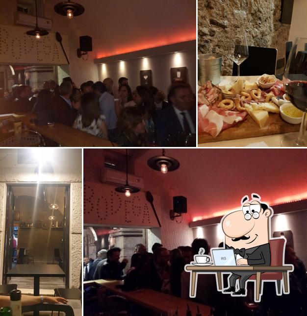 Dai un'occhiata agli interni di Bodega wine bar