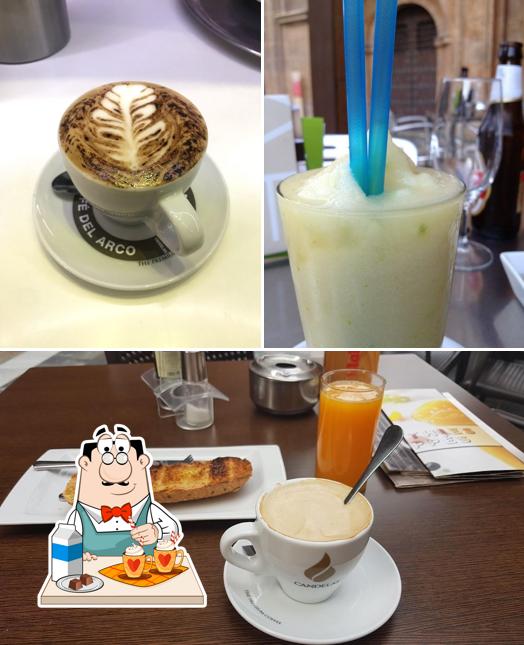 Enjoy a beverage at Café del Arco