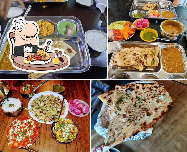 Try out pizza at DHARMA DHABA