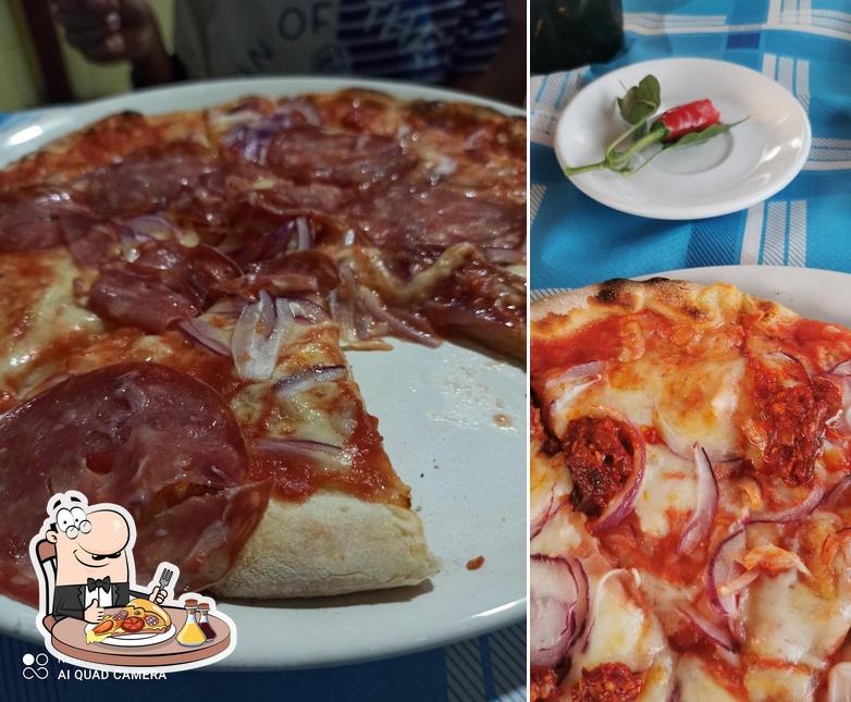 Essayez des pizzas à Trattoria - Pizzeria RAGGIO DI SOLE ️