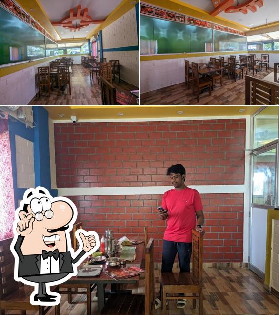 The interior of Hotel Sadha's Multicuisine restaurant A/C and non A/C