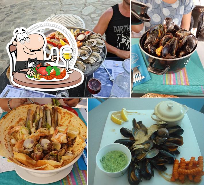 В "Bar/Brasserie de la Marine" вы можете попробовать разнообразные блюда с морепродуктами