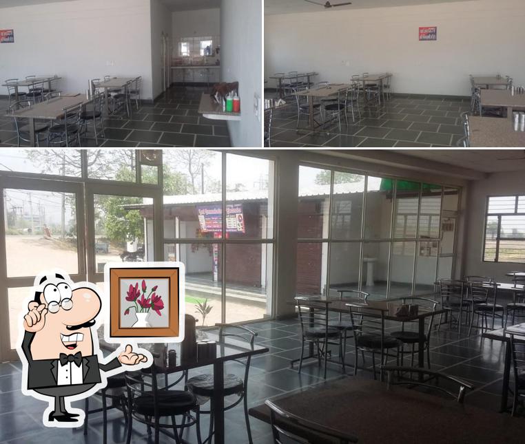 Take a seat at one of the tables at Mor Foods Veg. Dhaba