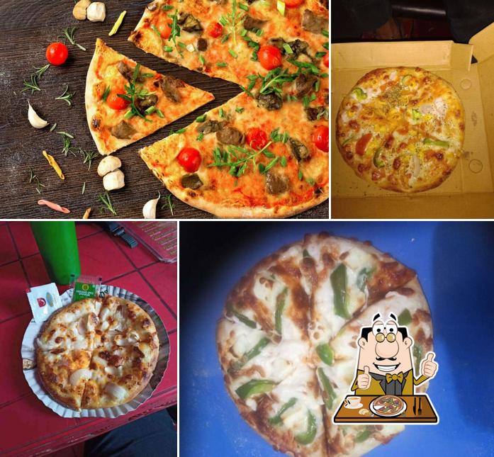 Try out pizza at Yash Foodies Corner