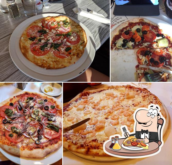 Prenez des pizzas à Restaurant Au Four à Bois