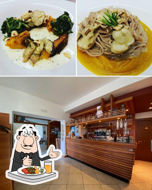 Questa è la foto che mostra la cibo e interni di Il Gusto Di Valtellina Hotel Bar Ristorante