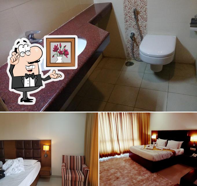 Take a seat at one of the tables at Hotel Saptagiri