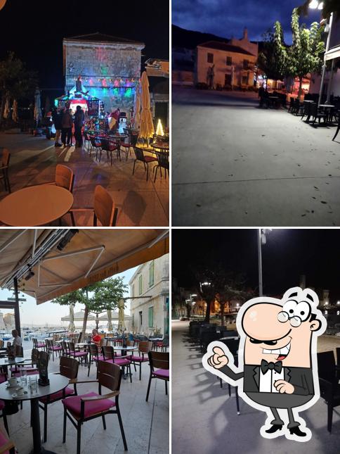 Siediti a un tavolo di Caffe Bar Speed