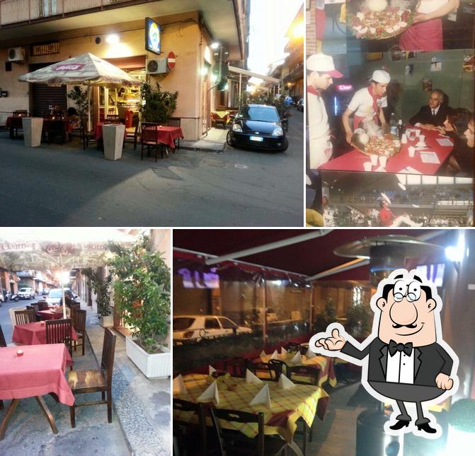 Dai un'occhiata agli interni di Pizzeria Rimini di Camonita