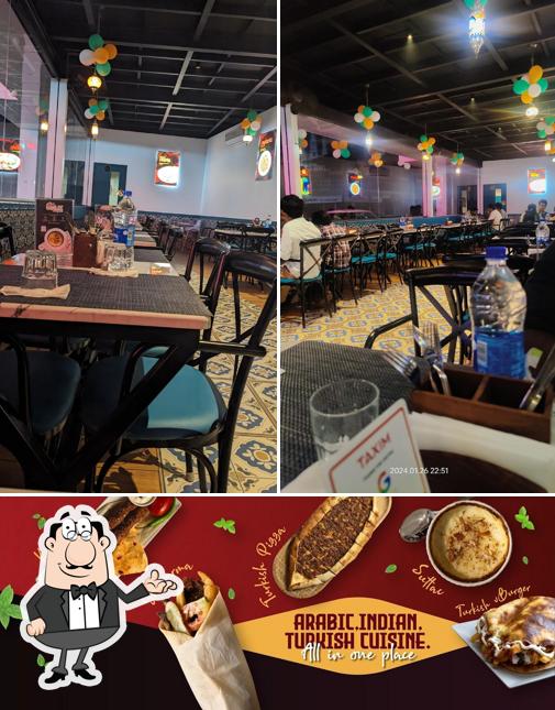This is the picture depicting interior and food at Taxim Restaurant