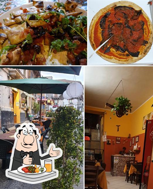 La foto di cibo e interni da Pizzeria Bella