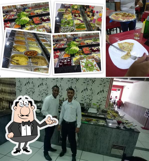 O interior do Emilly Pizzaria e Churrascaria