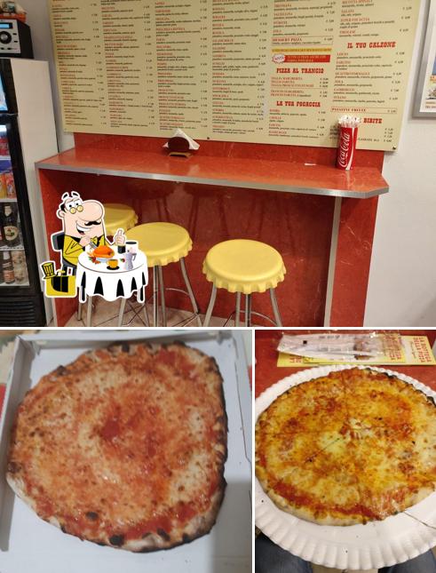 Questa è la immagine che mostra la cibo e interni di La Bottega Della Pizza