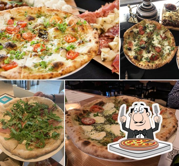 Try out pizza at Sixty Vines