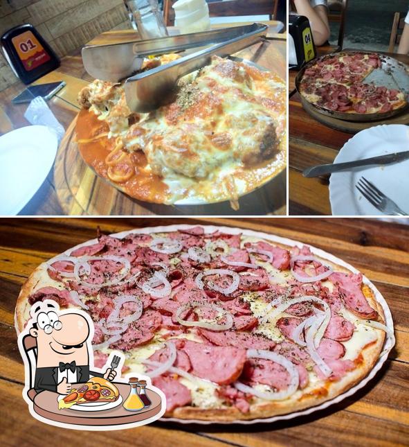 Consiga pizza no Village Pizzaria Fastfood Ou Rodízio pizzas e massas