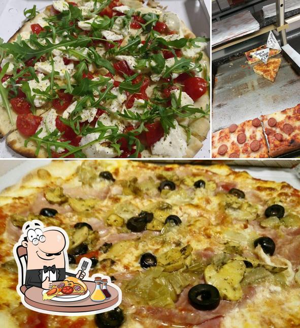 A Pizzeria Totò Sapore, puoi goderti una bella pizza