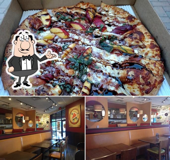 The photo of interior and pizza at Uncle Maddio's Pizza