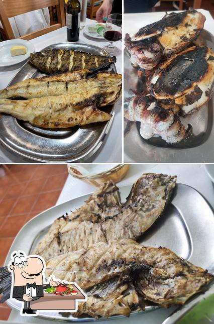Peça frutos do mar no Restaurante Toca do Texugo