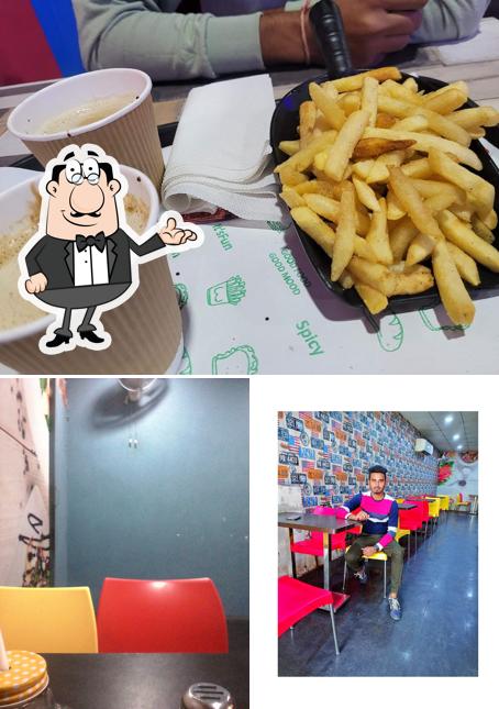Among different things one can find interior and food at Cafe Pizza Box