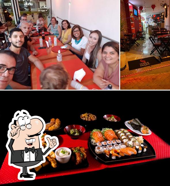 Entre diversos coisas, interior e comida podem ser encontrados a Sushi Cazza