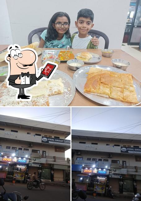 Take a look at the image displaying exterior and food at Dosa House