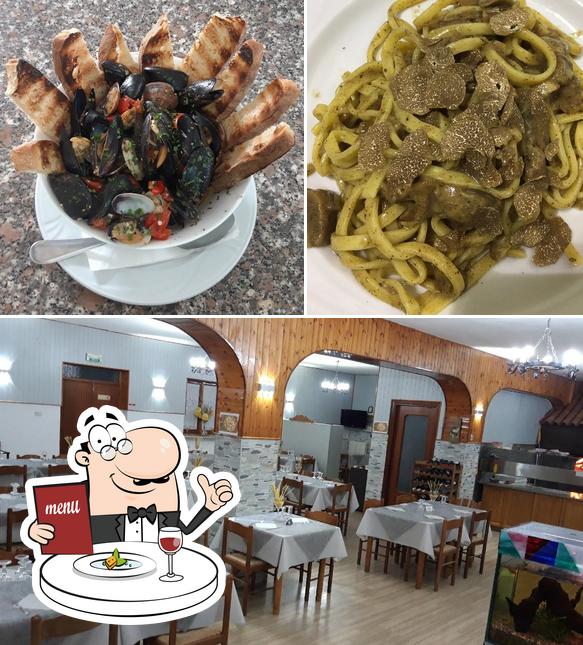 Questa è la immagine che presenta la cibo e interni di Il Barile